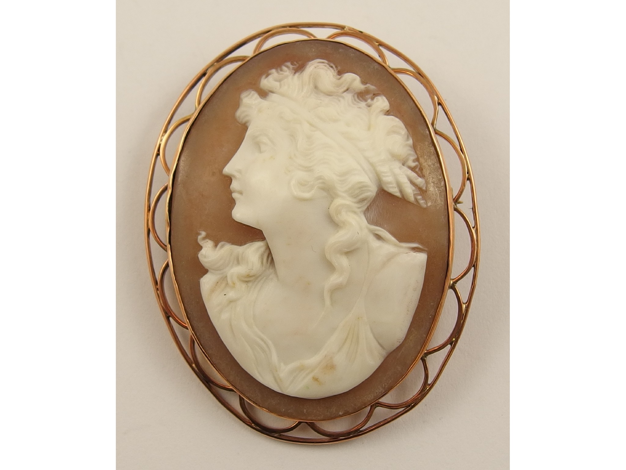 Appraisal: A well carved shell cameo of a maiden in a