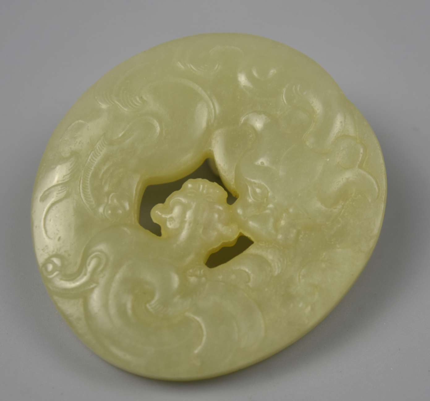 Appraisal: CHINESE PALE GREEN JADE PENDANT W CHILONG A jade pendant