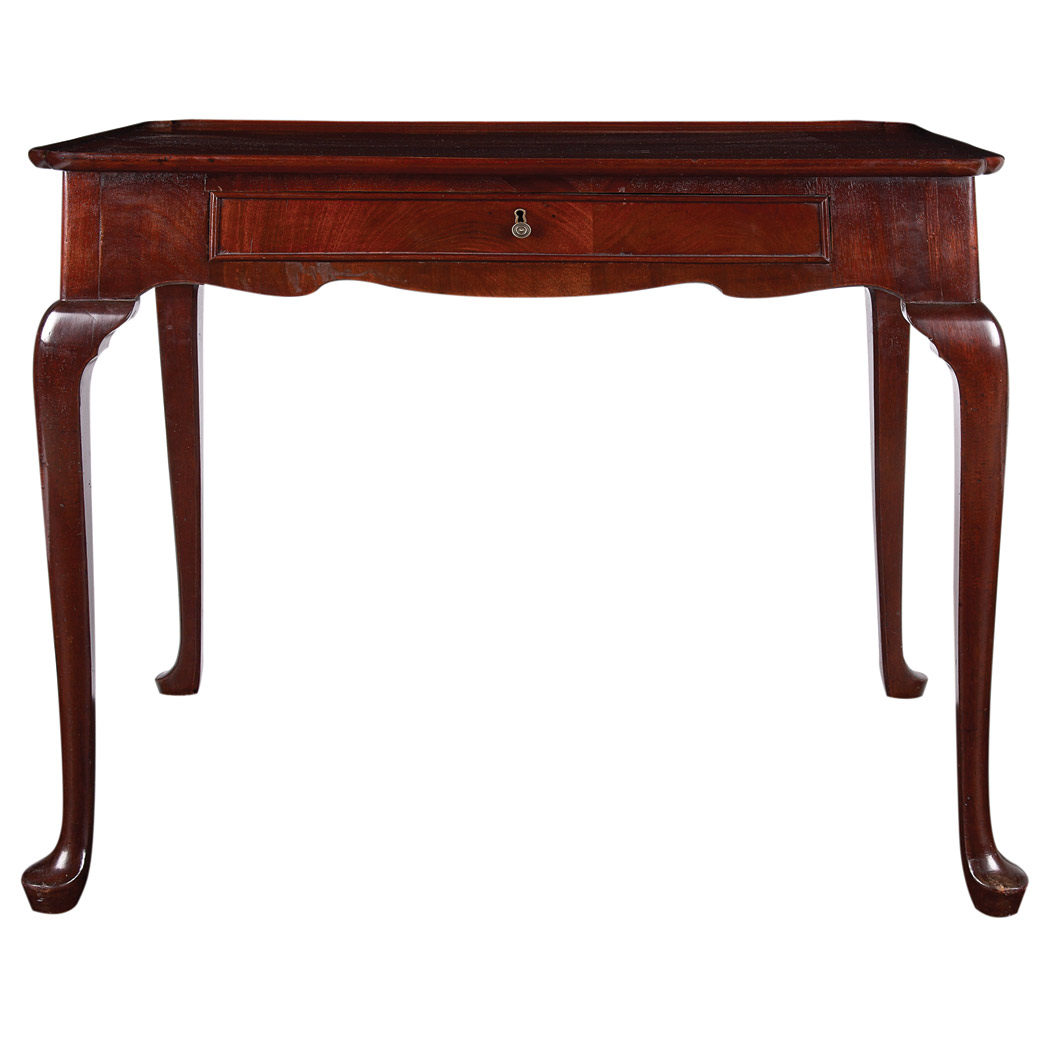 Appraisal: George II Mahogany Tea Table The dished rectangular top above