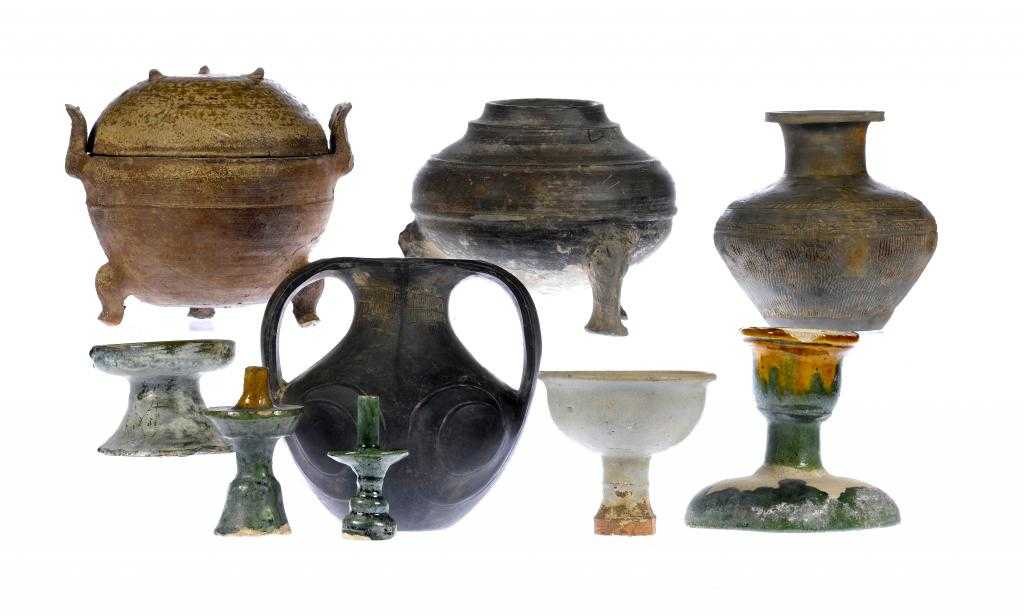 Appraisal: A GROUP OF EARLY CHINESE CERAMICS to include a tripod