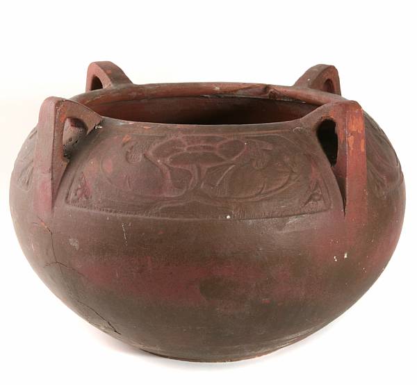 Appraisal: A terracotta four-handled jardini re possibly Liberty early th century