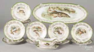 Appraisal: German fourteen-piece porcelain fish service late th c platter -