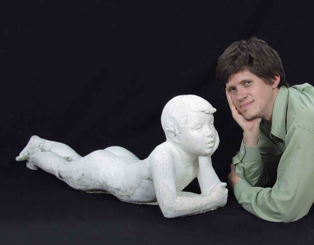 Appraisal: CONCRETE GARDEN STATUARY CA 's Realistic and lifesize statue of