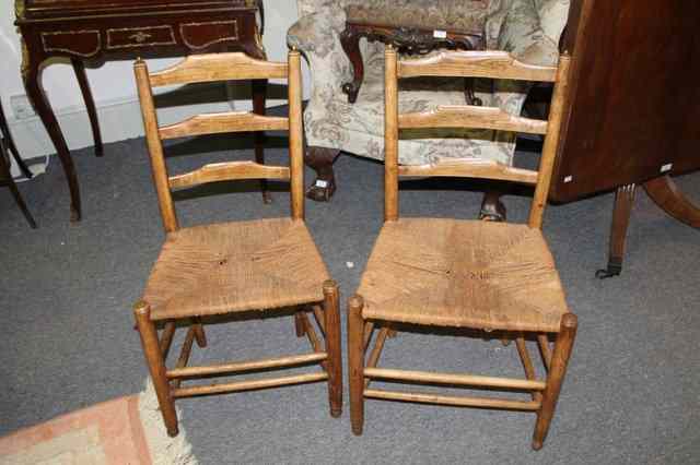 Appraisal: A SET OF FOUR ASHWOOD COTSWOLD STYLE LADDER BACK CHAIRS