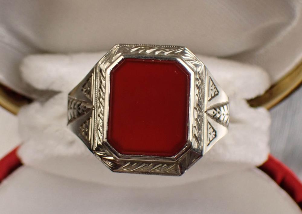 Appraisal: MAN'S CARNELIAN AND FOURTEEN KARAT GOLD RING The k white