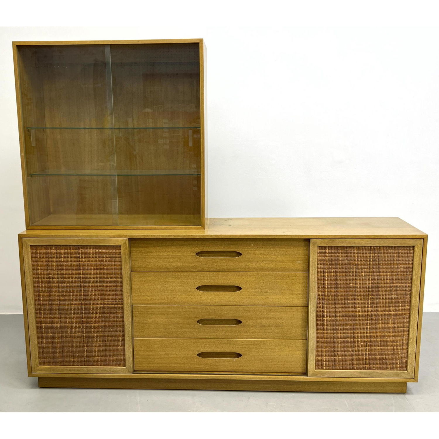 Appraisal: HARVEY PROBBER Credenza with china top Cane sliding doors Dimensions