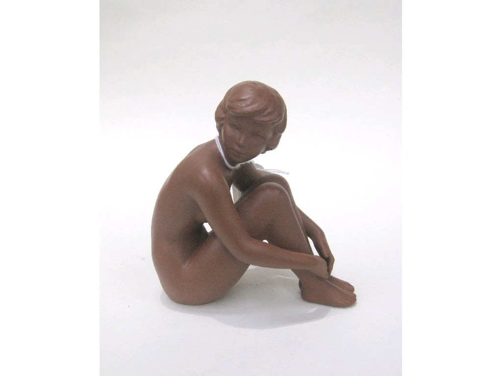 Appraisal: Goebel figure of a seated nude female figure in brown