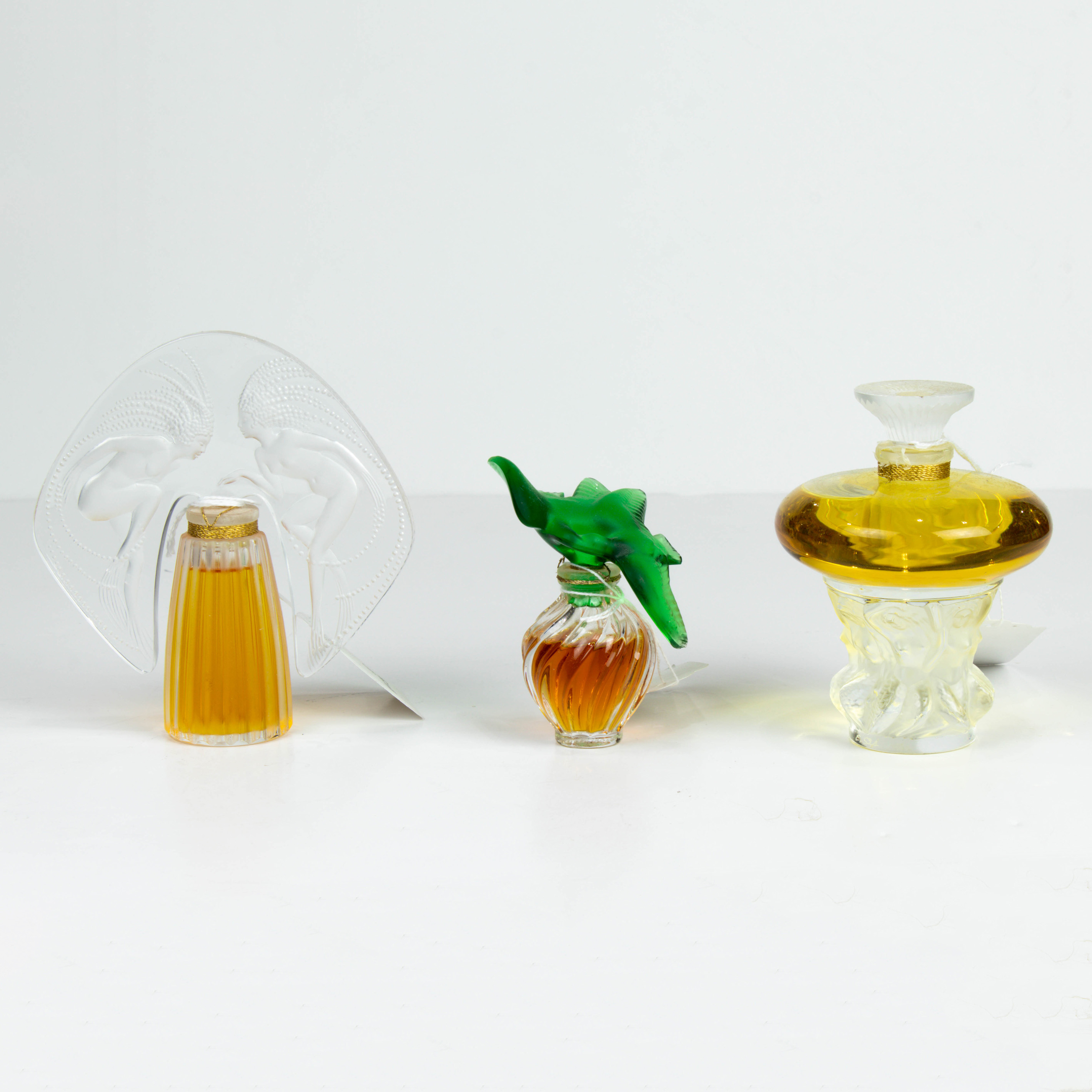 Appraisal: LOT OF LALIQUE GLASS FILLED PERFUME BOTTLES Lot of Lalique