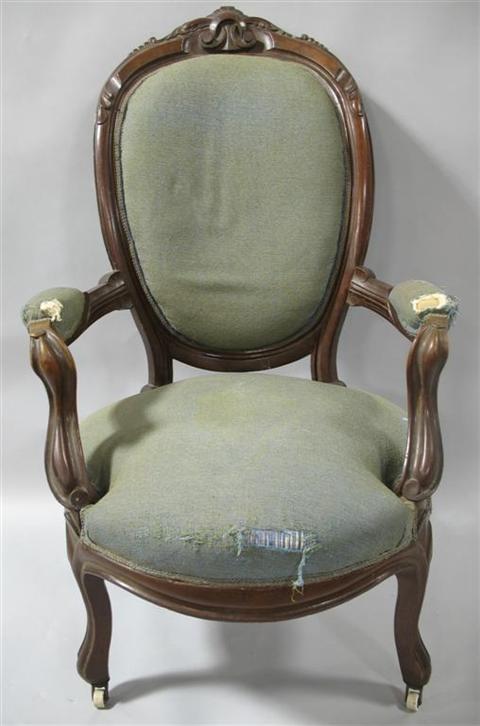 Appraisal: VICTORIAN STYLE BALLOON BACK ARMCHAIR The carved frame with oval