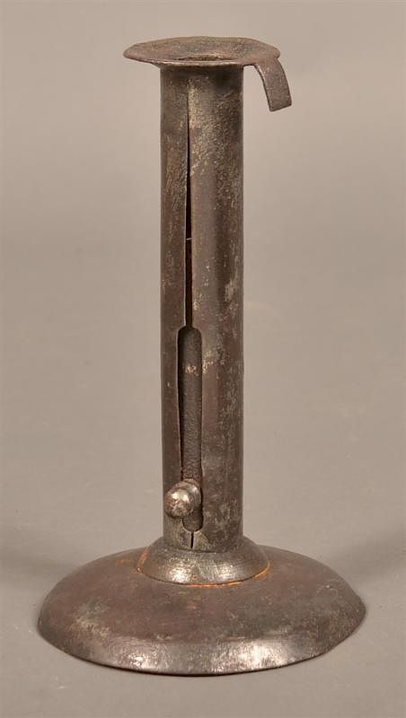 Appraisal: th Century Hog Scrapper Push Up Candlestick th Century Hog