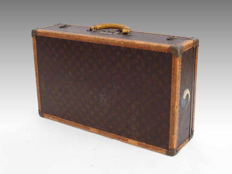 Appraisal: VINTAGE LOUIS VUITTON SUITCASE In used condition painted Yin Yang