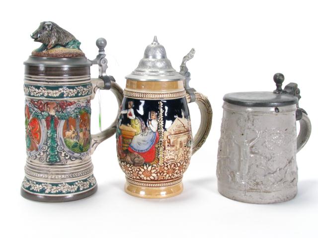 Appraisal: Vintage German drinking vessels including barrel bodied stein depicting tavern