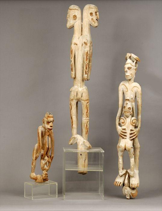 Appraisal: African Polychrome Carved Wood Erotic Group and Two Other Male