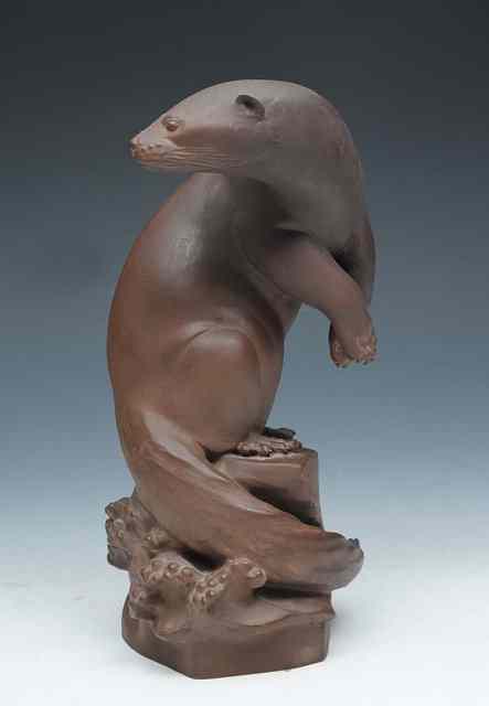 Appraisal: A Meissen Bottger stoneware model of an otter designed by