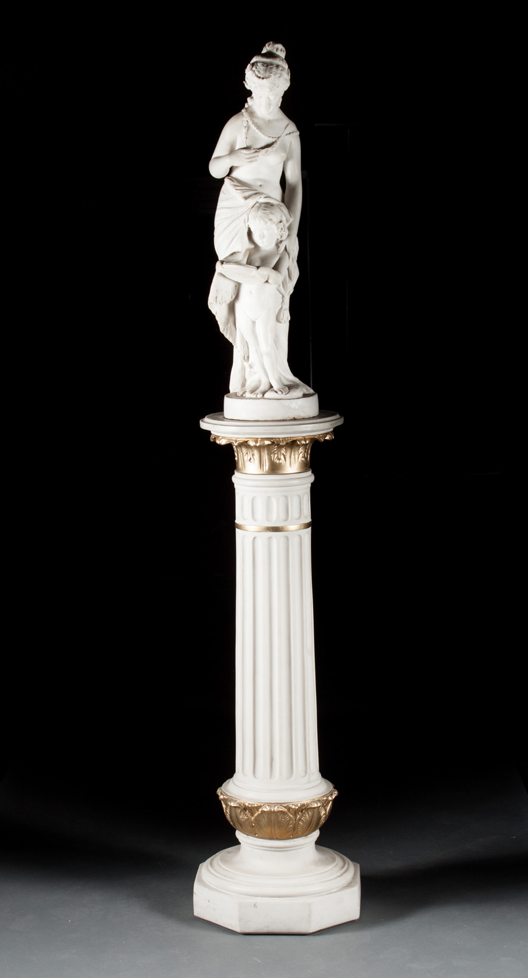 Appraisal: Classical style resin figural group and column figures modeled as