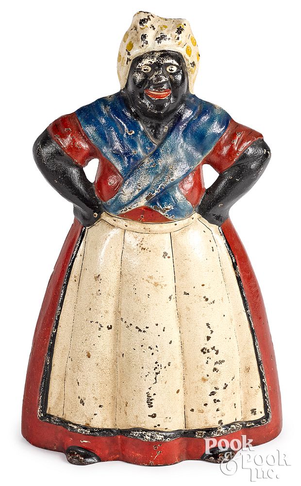 Appraisal: Painted cast iron Mammy doorstop early th c Painted cast