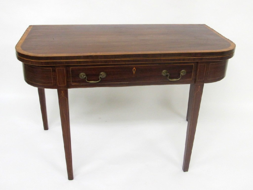 Appraisal: An Edwardian mahogany inlaid turnover tea table the hinged top