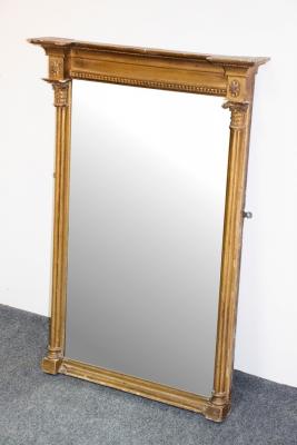 Appraisal: A Regency gilt framed mirror the plate flanked by reeded