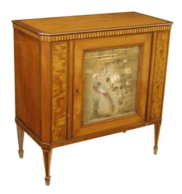 Appraisal: A Dutch satinwood commode inlaid stringing and with canted angles