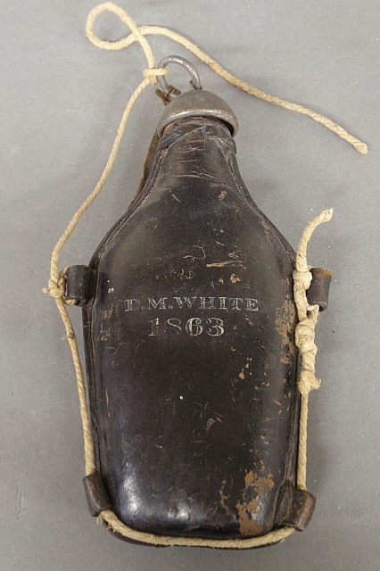 Appraisal: - Civil War Era black leather cased glass canteen with