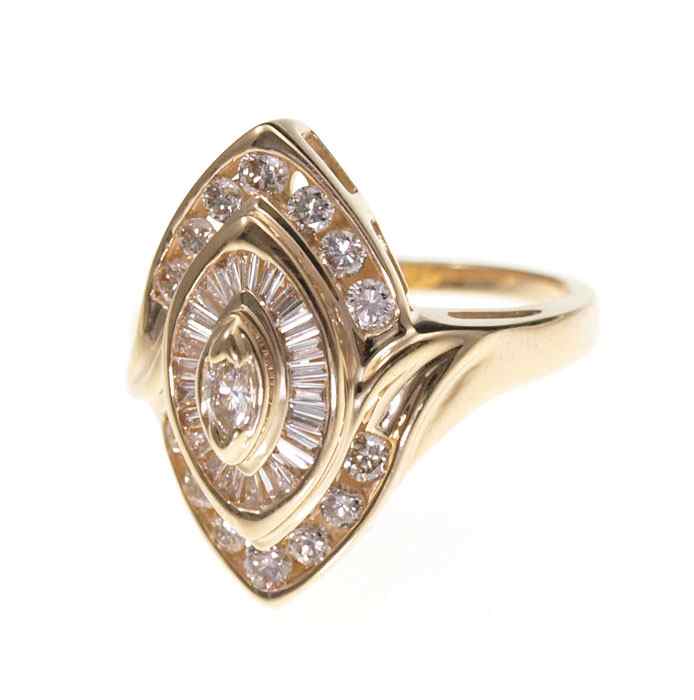 Appraisal: CT DIAMOND RING K yellow gold ring centers a marquise