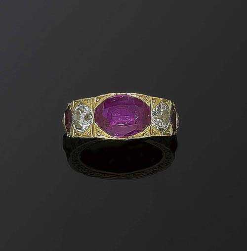 Appraisal: RUBY AND DIAMOND RING ca Yellow gold Decorative band ring