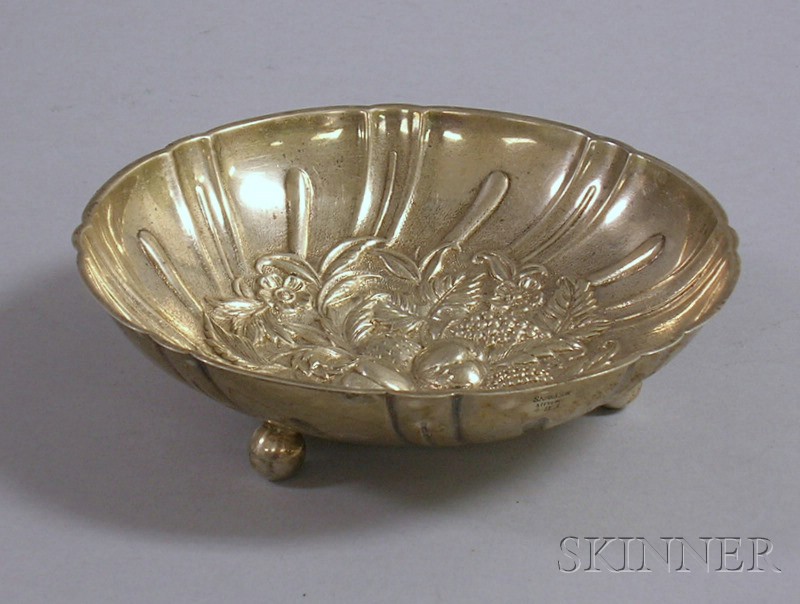 Appraisal: Kirk Sterling Repousse Dish with Ball Feet approx five troy