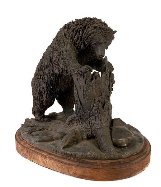 Appraisal: A patinated bronze model of a bear cast after a