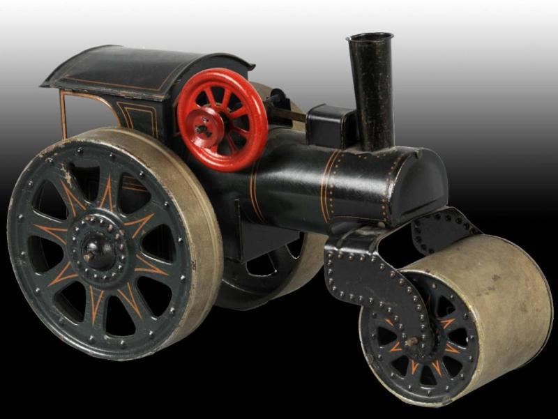 Appraisal: German Tin Wind Up Steam Roller Description Believe to have