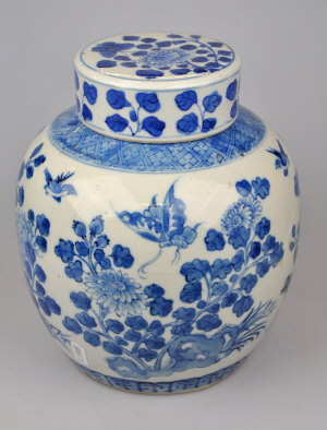 Appraisal: A Chinese blue and white ovoid vase decorated with butterflies