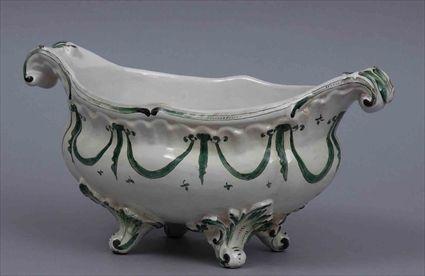 Appraisal: ROCOCO-STYLE FAIENCE BOAT-FORM CENTERPIECE Marked in underglaze green S X