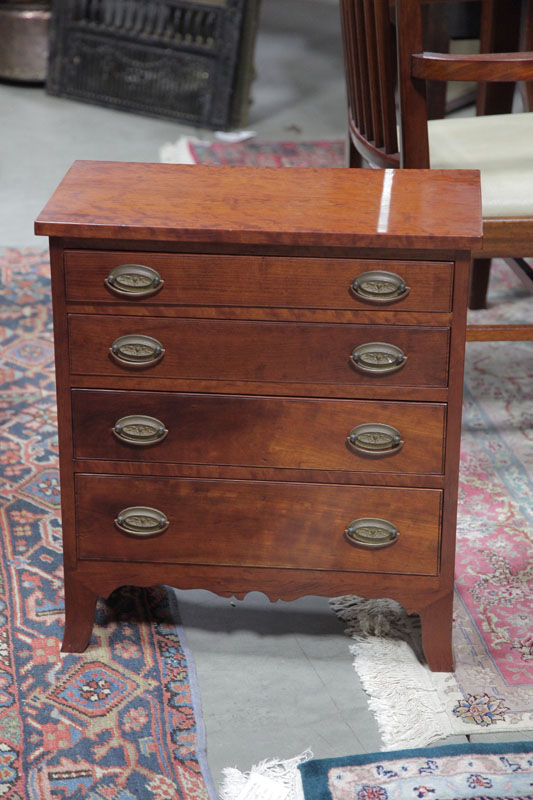 Appraisal: CHILD SIZE REPRODUCTION CHEST OF DRAWERS Cherry having four graduated