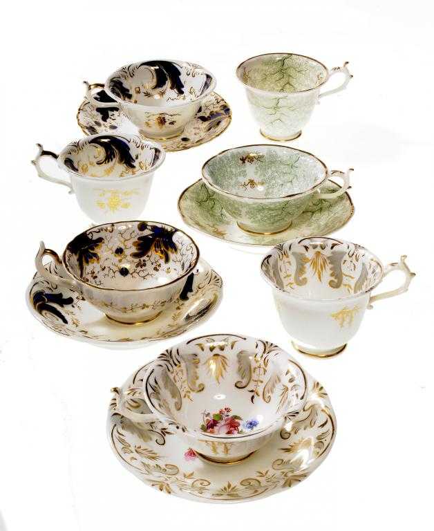 Appraisal: THREE ROCKINGHAM TRIOS AND A TEACUP AND SAUCER one printed