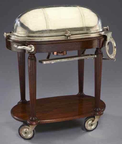 Appraisal: Mahogany and silver plate rollover roast servingcart the domed cover