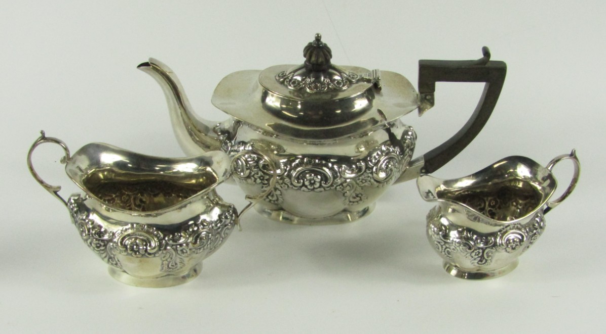 Appraisal: An Edwardian silver three piece tea set comprising teapot sugar