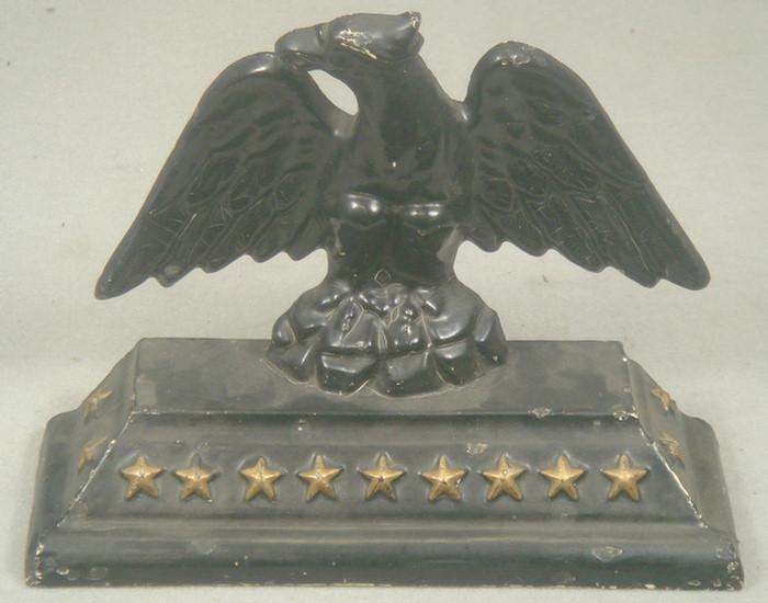 Appraisal: Cast iron doorstop black eagle with wings spread on brown