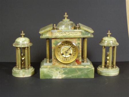 Appraisal: A late th early th century green onyx clock garniture