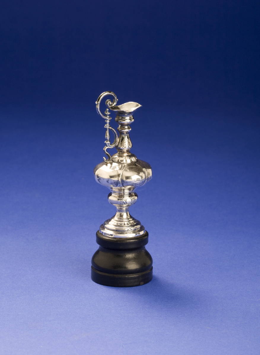 Appraisal: MINIATURE COMMEMORATIVE SILVER TROPHY FROM THE AMERICA'S CUP The trophy