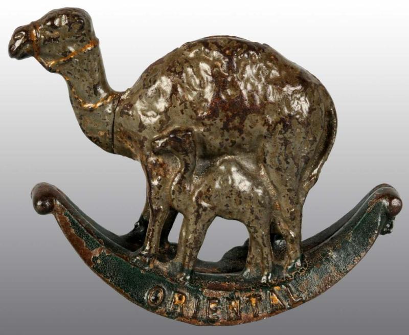 Appraisal: Cast Iron Oriental Camel Still Bank Description All original Condition