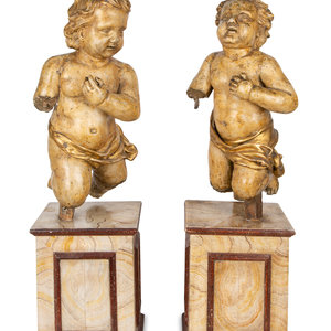 Appraisal: A Pair of Italian Carved and Parcel Gilt Cherubs TH