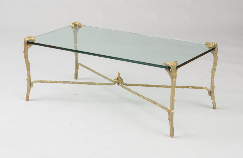 Appraisal: BAGUES STYLE GILT-BRONZE-MOUNTED GLASS LOW TABLE Marked 'P E Guerin'