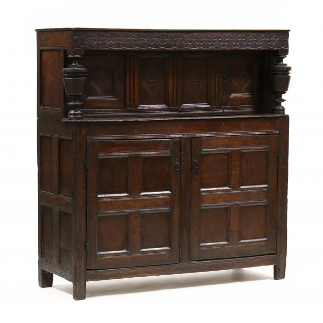 Appraisal: ENGLISH JACOBEAN CARVED OAK COURT CUPBOARD Late th century two