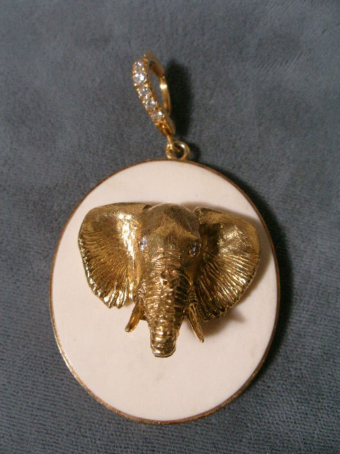 Appraisal: Pendant of Ivory and K Yellow Gold oval form ivory