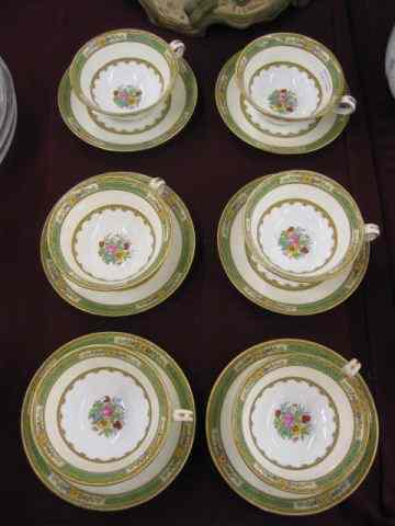 Appraisal: Minton China Cups Saucers enameled florals excellent