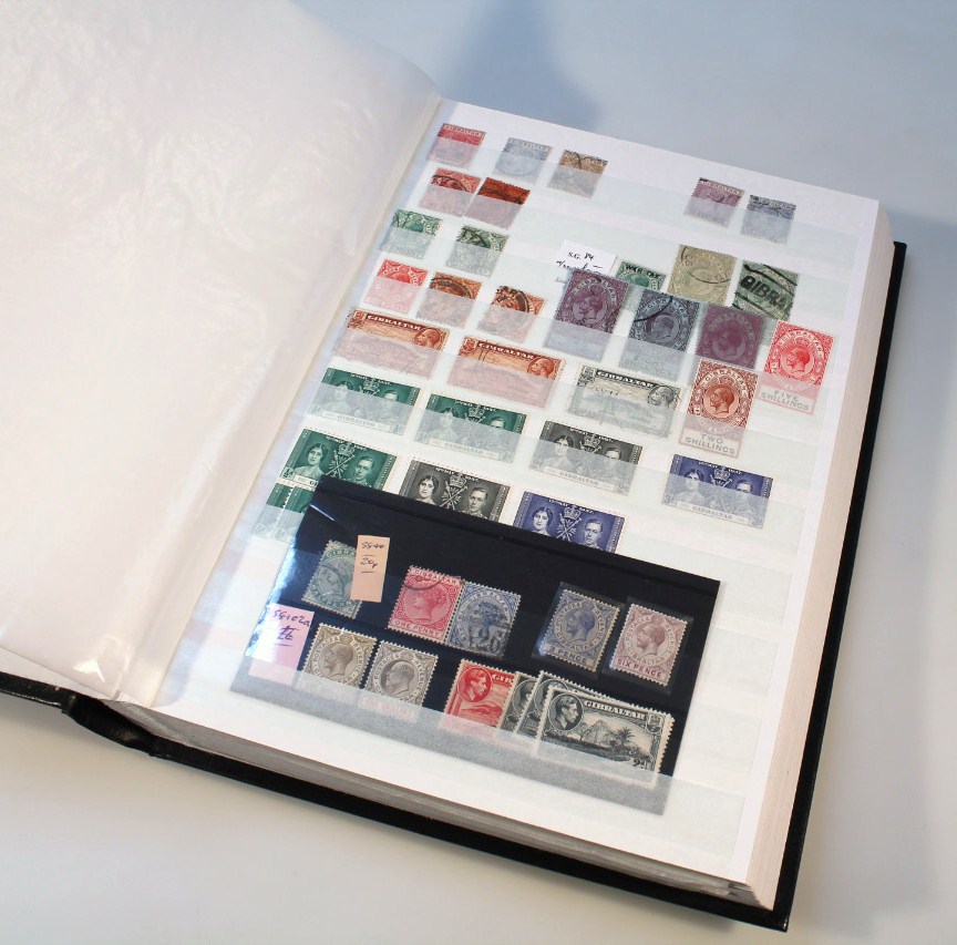 Appraisal: An album of Gibraltar stamps including mint and unused blocks