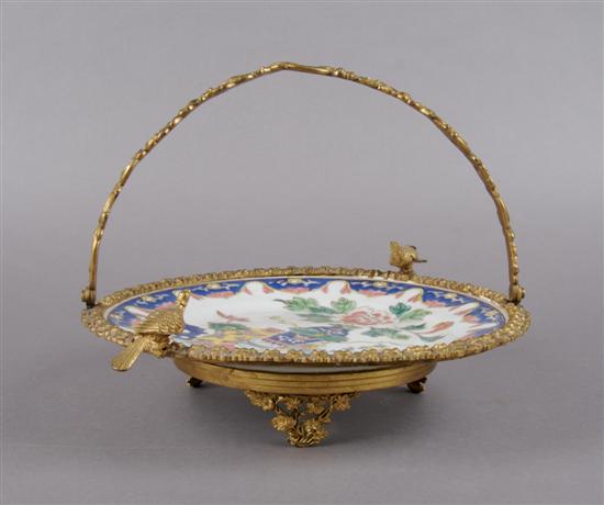 Appraisal: A Gilt Metal Mounted Porcelain Plate Diameter of plate inches