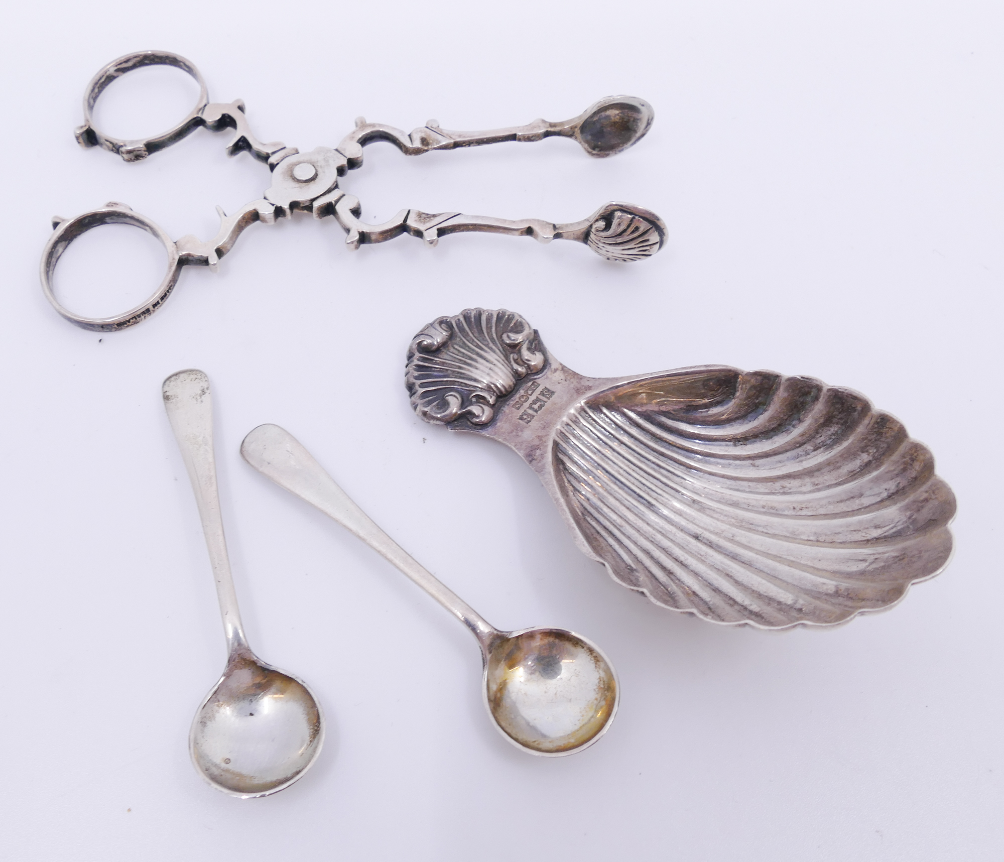 Appraisal: Box English Sterling Sugar Tongs Etc- g TW