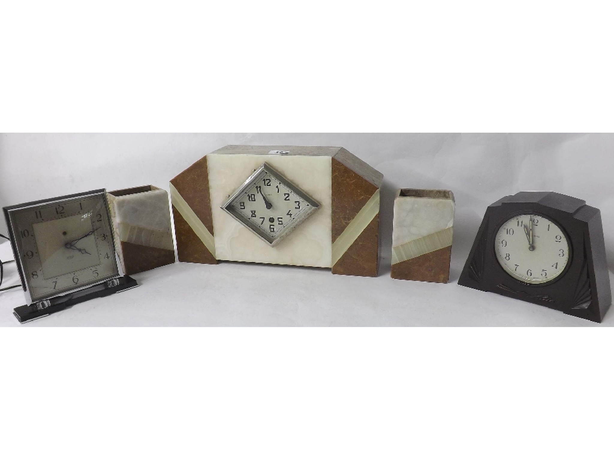 Appraisal: French Art Deco marble clock garniture with diamond shaped dial