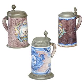 Appraisal: SPONGEWARE FAIENCE STEINS Three Each purple sponge decorated with engraved