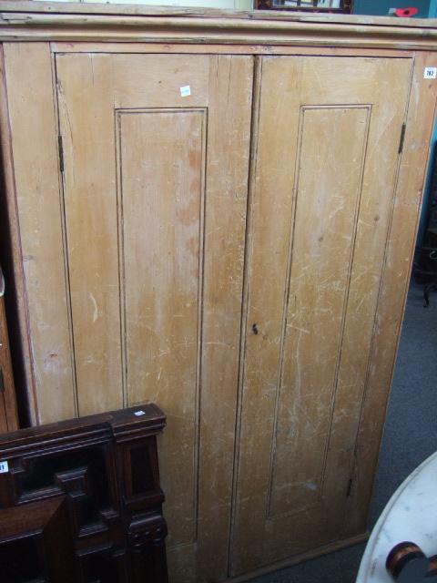 Appraisal: A th century pine hall cupboards the pair of panel